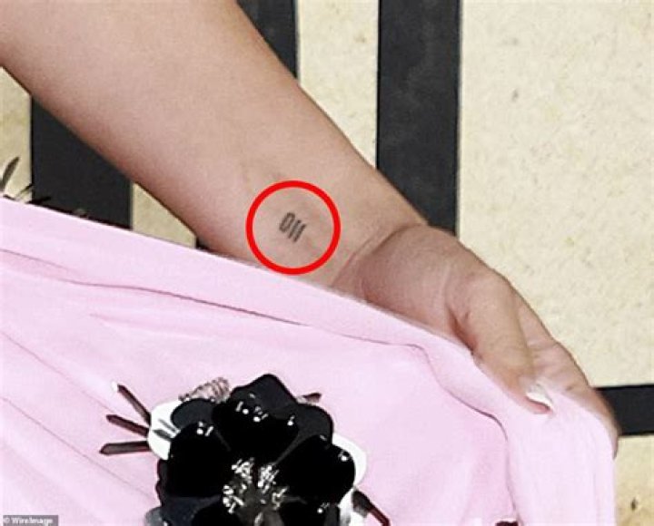 Does Millie Bobby Brown have 11 tattoo?