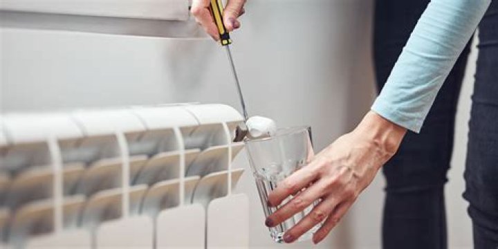 How do I know if my radiators need bleeding?