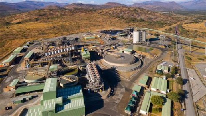 Who owns platinum mines in South Africa?